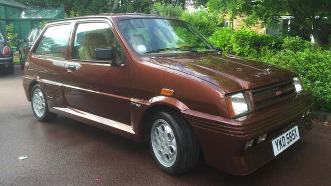 A brown Frazer-Tickford Metro hatchback 