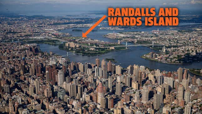 A photo of the New York skyline taken from above with an orange arrow pointing to Randalls Island in the East River.