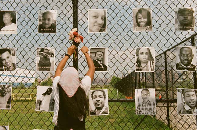 Locals install flowers and 187 portraits of Black people who died at the hands of police or while fighting racial injustices.