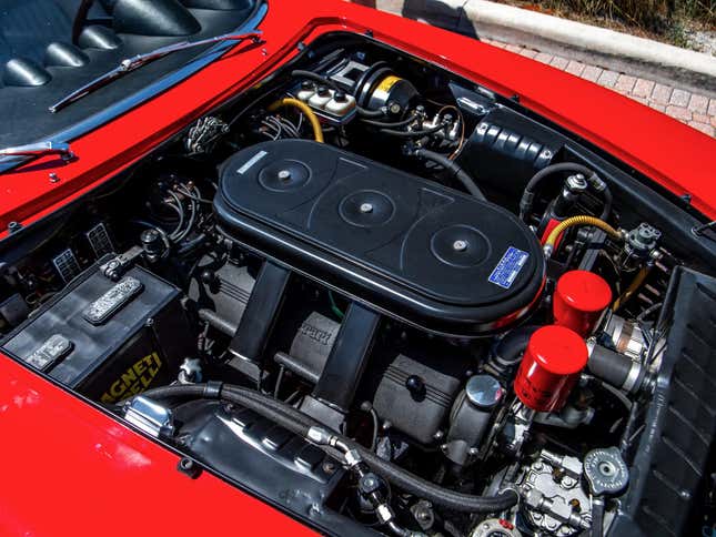 Engine bay of a red 1967 Ferrari 365 California Spyder