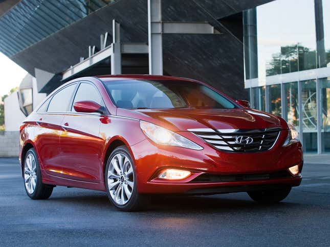 Red 2010 Hyundai Sonata front three-quarter angle view