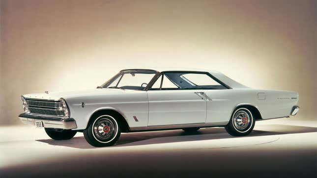 A photo of a white Ford Galaxie sedan. 