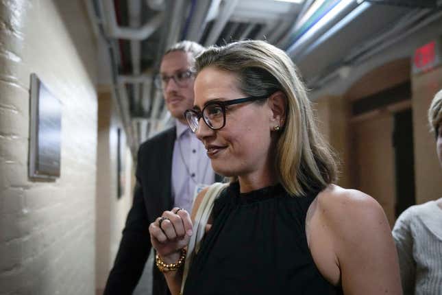 Sen. Kyrsten Sinema (D-AZ) walks to a vote at the U.S. Capitol on July 28, 2022, in Washington, DC. On Wednesday, Senate Majority Leader Chuck Schumer (D- NY) and Sen. Joe Manchin (D-WV) announced an agreement on sweeping energy and climate bill.