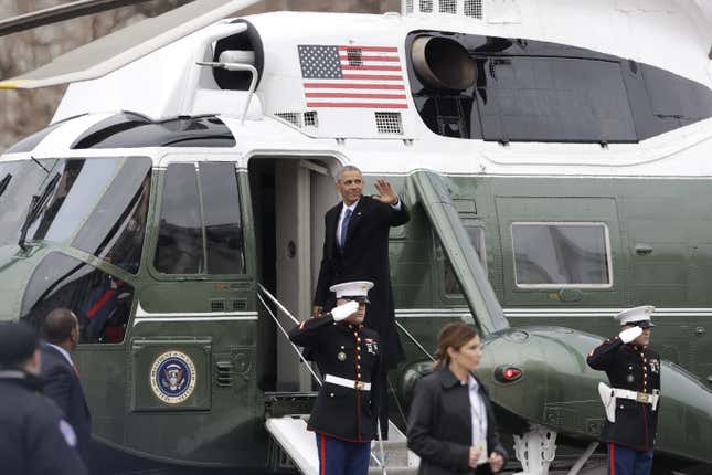 Former President Barack Obama waves as he prepares to leave the East Front of the Capitol after the inauguration of Donald Trump in Washington, Friday, Jan. 20, 2016.