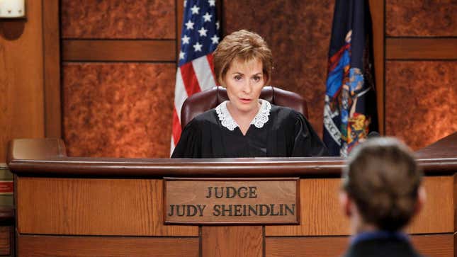 Judge Judy sat at her podium