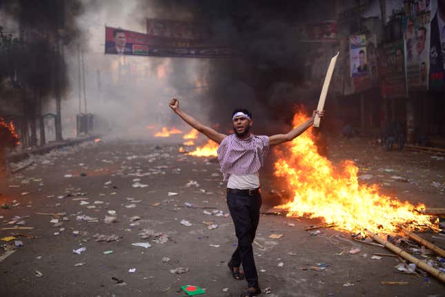 FILE- An activist of the opposition Bangladesh Nationalist Party (BNP) shout slogans during a protest in Dhaka, Bangladesh, Oct. 28, 2023. BNP is boycotting the Jan. 7 polls, saying the government cannot ensure a fair vote, and setting the stage for Prime Minister Sheikh Hasina to secure her fourth consecutive and fifth overall term in office. (AP Photo/Mahmud Hossain Opu, File)