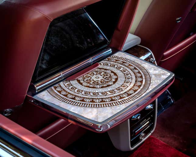 A mother-of-pearl picnic table in a Rolls-Royce Cullinan