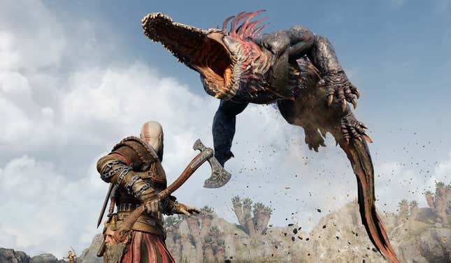 Kratos wields an axe as a giant lizard-type enemy attacks.