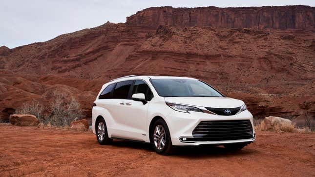 A white Toyota Sienna in a desert landscape