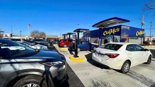 Cars wait in the four-lane drive-thru of the first CosMc’s in Illinois.