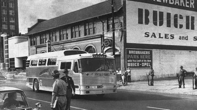 In this May 15, 1961 file photo, a bus bearing Freedom Riders leaves the station as they resumed their rides through the South in Montgomery, Ala. .