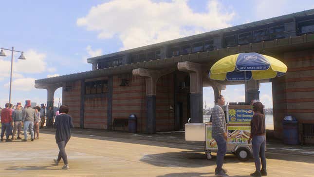 People walk in front of the bathrooms at Coney Island.