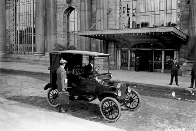 A Ford Model T on a city street in 1915.