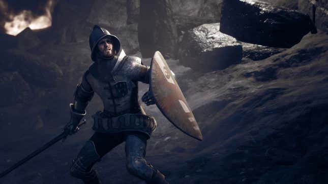 Shep, in full armor, holds a sword and shield.