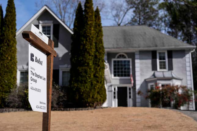 FILE - A sign announcing a home for sale is posted outside a home on Feb. 1, 2024, in Kennesaw, Ga., near Atlanta. On Thursday, March 14, 2024, Freddie Mac reports on this week&#39;s average U.S. mortgage rates. (AP Photo/Mike Stewart, File)