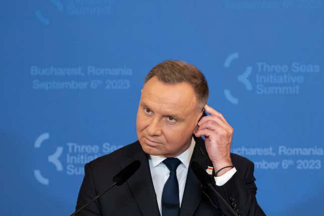 FILE - Poland&#39;s President Andrzej Duda adjusts his headphones during a press conference at the Cotroceni Presidential Palace in Bucharest, Romania, Wednesday, Sept. 6, 2023. Poland&#39;s minister of digital affairs suggested Friday, Jan. 5, 2024, that President Andrzej Duda check the security of access to his social accounts after a bizarre tweet went out that was almost immediately removed. (AP Photo/Andreea Alexandru, File)