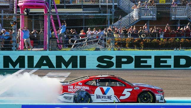 Oct 23, 2022; Homestead, Florida, USA; NASCAR Cup Series driver Kyle Larson (5) celebrates winning the Dixie Vodka 400 at Homestead-Miami Speedway.