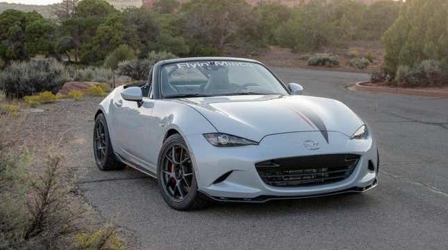 White Flyin' Miata convertible