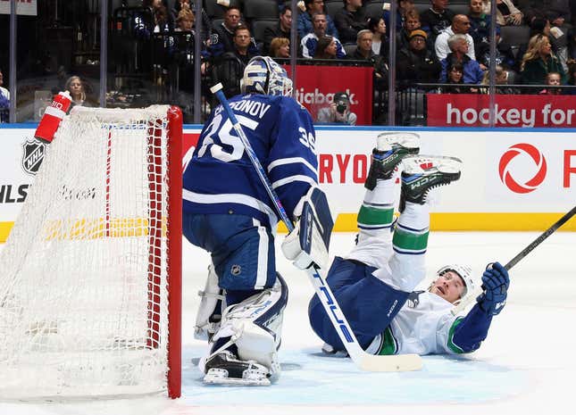 TORONTO, CANADA - NOVEMBER 11: Brock Boeser #6 of the Vancouver Canucks hits the ice in front of Ilya Samsonov #35 of the Toronto Maple Leafs during the first period at Scotiabank Arena on November 11, 2023 in Toronto, Ontario, Canada. (Photo by Bruce Bennett/Getty Images)