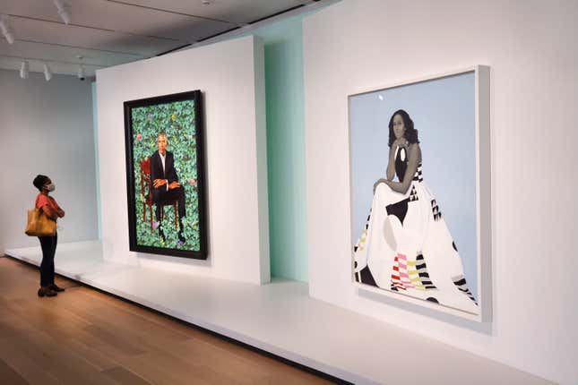 Visitors view the official portraits of former president Barack Obama by Kehinde Wiley and former first lady Michelle Obama by Amy Sherald at The Art Institute of Chicago on June 18, 2021 in Chicago, Illinois. (Photo by Scott Olson/Getty Images)