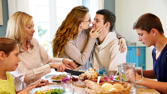 Image for article titled Report: Sister Just Sitting On Boyfriend’s Lap Right There At Family Dinner