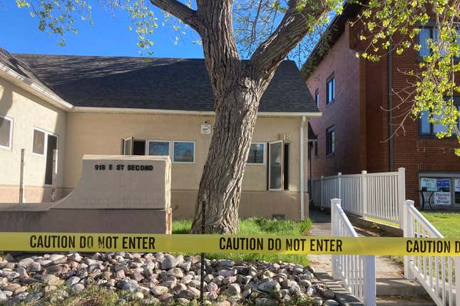 Police tape is placed at the scene of an overnight fire that severely damaged a building that was being renovated to house a new abortion clinic in Casper, Wyoming, Wednesday, May 25, 2022. The clinic, which would also provide other health care for women, had been set to open in June. It would become only the second place in the state to offer abortions.