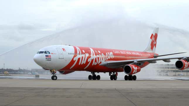 An Airbus A340 being greeted after landing on its first Kuala Lumpur to Paris service