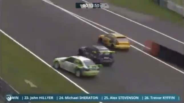 The Ford Escort, left, just before crashing into the marshal stand.