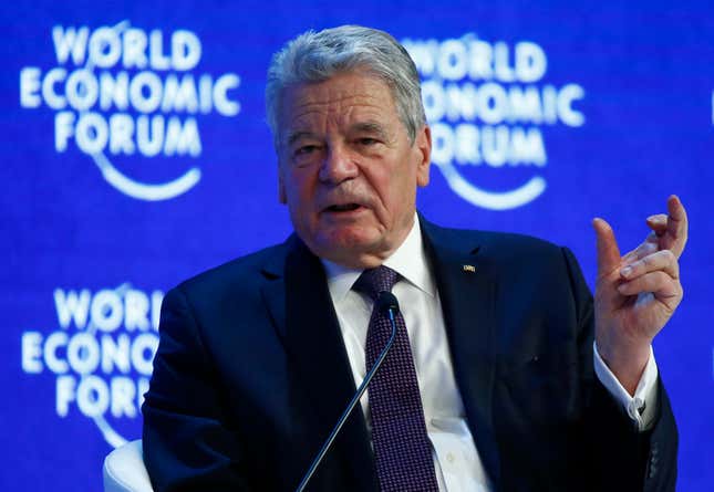 Image for article titled Photos: What everyone’s really saying at Davos, in body language