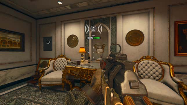 An ornate room with a radio and wall safe in proximity to each other.