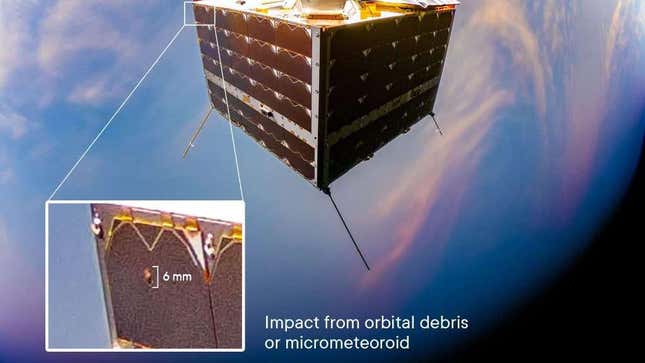 The selfie image featuring the solar panel impact hole on Kongsberg NanoAvionics' MP42 satellite