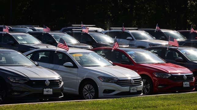 Colorful cars on the forecourt at a dealership in America. 