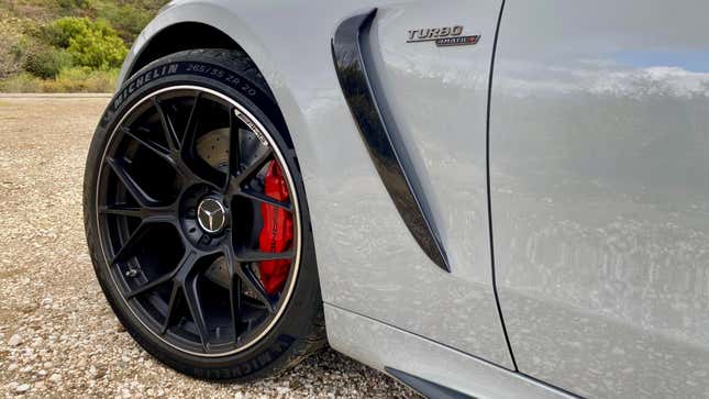 a photo of the left front wheel and the massive red AMG brakes