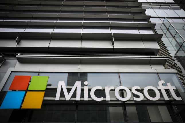 below view of Microsoft logo on grey building