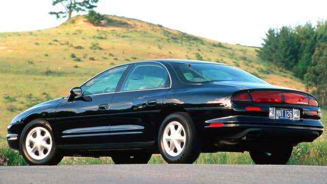 A black Oldsmobile Aurora Sedan 