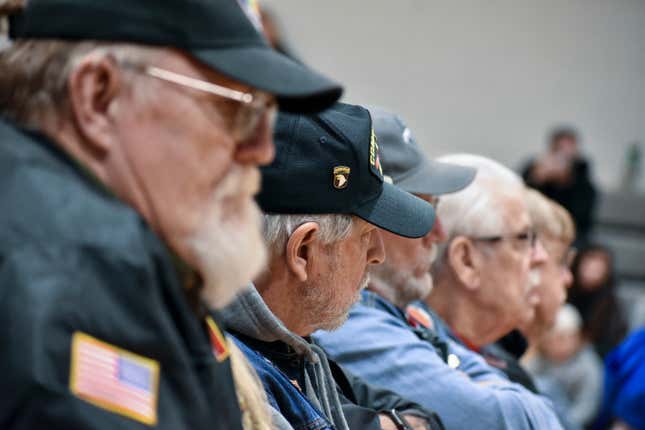 Military veterans are seen at a Veterans Day event at Bigfork High School, Nov. 10, 2023, in Bigfork, Mont. Voters in the state will decide next year if Sen. Jon Tester gets a fourth term as he&#39;s expected to face strong Republican opposition. (AP Photo/Matthew Brown)