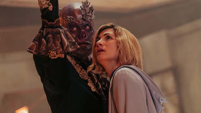Skeletal alien villain The Swarm raises a hand while Jodie Whittaker's 13th Doctor looks on in concern in Doctor Who: Flux