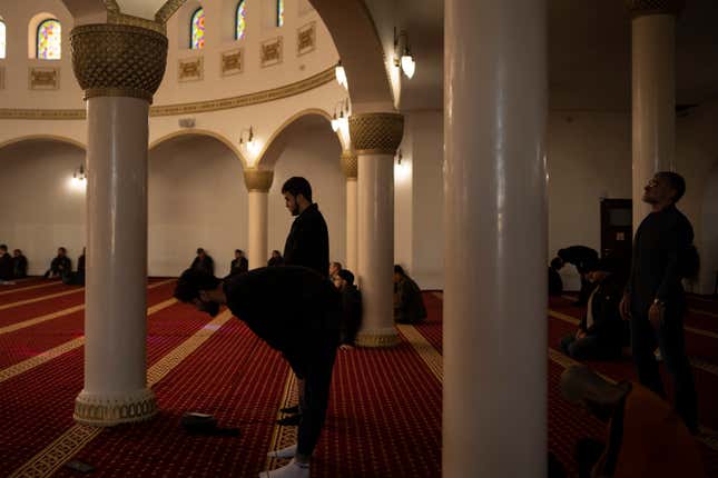 People pray inside the Ar-Rahma mosque during Friday prayers in Kyiv, Ukraine, Friday, Oct. 27, 2023. (AP Photo/Bram Janssen)