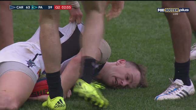 Aussie Rules Player Knocked Out By Sling Tackle