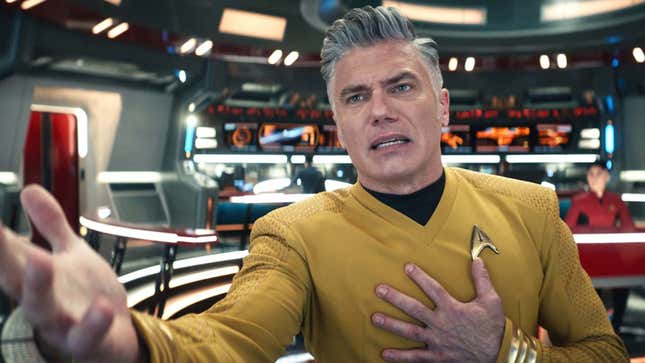 A photo shows Captain Pike from Star Trek singing his heart out. 