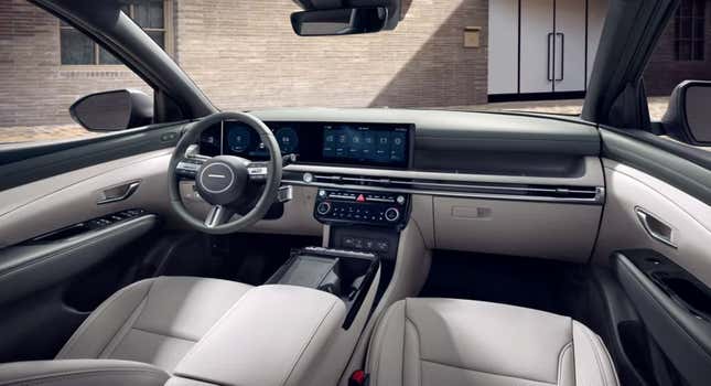 The interior of the new Tucson features Hyundai's new corporate design which reintroduces physical switchgear for radio and climate control operation and moved the gear selector to a stalk on the steering column.