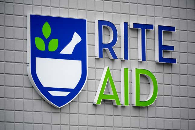 FILE - A Rite Aid sign is displayed on the facade of a store in Pittsburgh, Monday, Jan. 23, 2023. Rite Aid plans to plans to close about 7% of its stores initially, as the drugstore chain makes its way through its Chapter 11 bankruptcy process. (AP Photo/Gene J. Puskar)