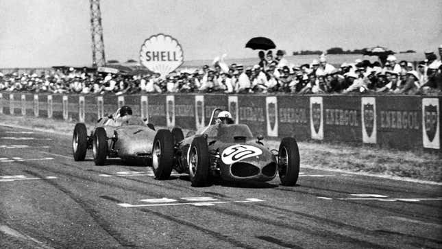 A black and white photo of Giancarlo Baghetti during the French Grand prix. 