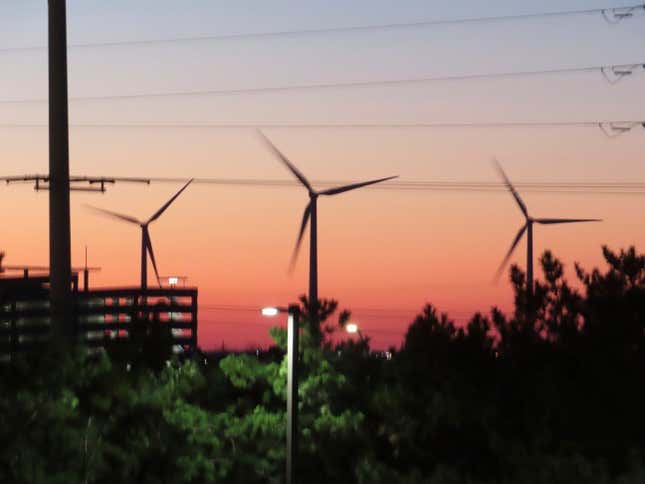 Land-based wind turbines spin in Atlantic City, N.J., on Dec. 13, 2023. A federal agency on Monday, Dec. 18, 2023, determined that the proposed Atlantic Shores offshore wind farm is likely to &quot;adversely affect&quot; but not kill marine life including whales off the coast of New Jersey. (AP Photo/Wayne Parry)