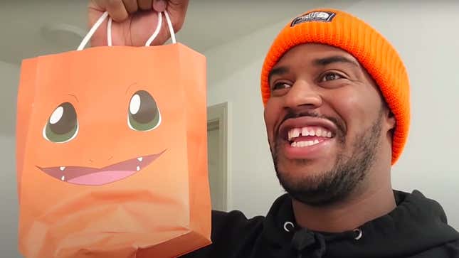 Screenshot of man in orange beanie with trick-or-treat bag