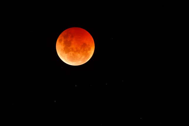 MELBOURNE, AUSTRALIA - NOVEMBER 08: The ‘Blood Moon’ or lunar eclipse is seen from Williamstown in Melbourne on November 08, 2022 in Melbourne, Australia.