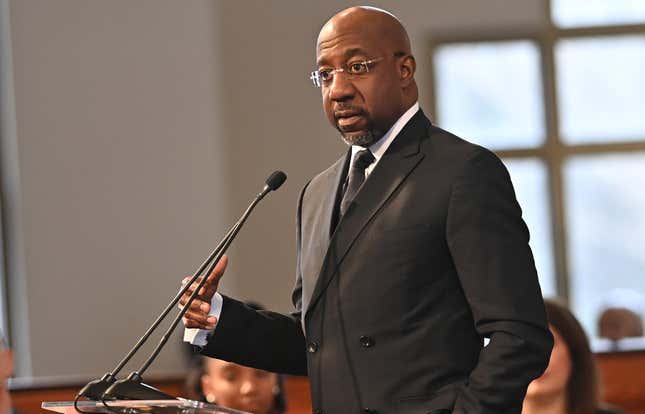 ATLANTA, GEORGIA - JANUARY 15: U.S. Senator Rev. Raphael Warnock (D-GA) speaks onstage during the 2024 Martin Luther King, Jr. Beloved Community Commemorative Service at Ebenezer Baptist Church on January 15, 2024 in Atlanta, Georgia. The annual service is held in honor of the life of civil rights icon Dr. Martin Luther King, Jr. who would have turn 95 on January 15th. 