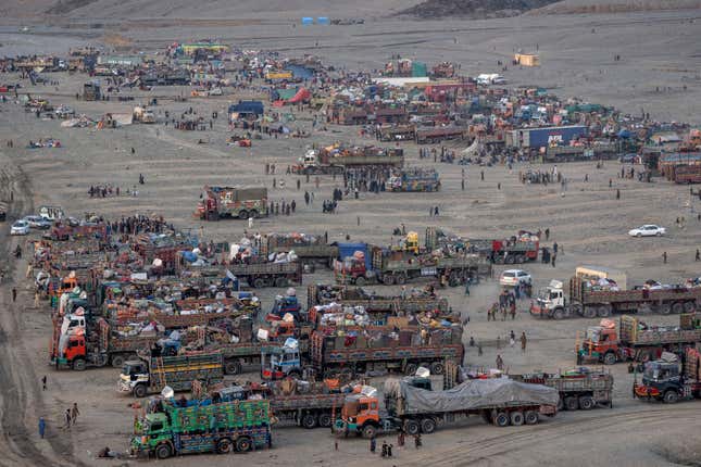 FILE- Afghan refugees settle in a camp near the Torkham Pakistan-Afghanistan border, in Torkham, Afghanistan, Friday, Nov. 3, 2023. The Taliban says Pakistan has effectively closed a key northwestern border crossing with Afghanistan to truck drivers. Pakistani authorities began requesting passports and visas from Afghan drivers, according to a Taliban official. (AP Photo/Ebrahim Noroozi, File)