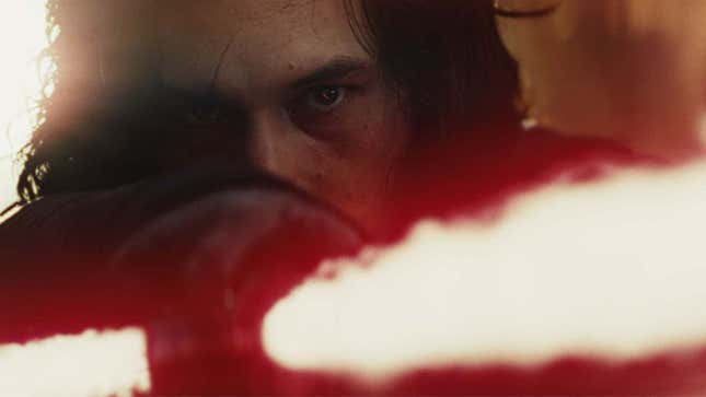 Kylo Ren igniting his lightsaber. 