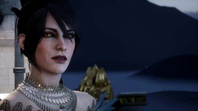 A close-up of Morrigan wearing an off-the-shoulder feathered gown and ornate necklace in Dragon Age: Inquisition.